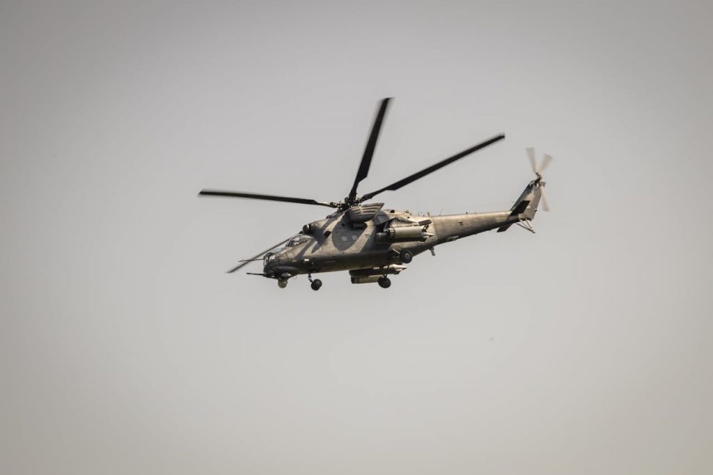 A military attack helicopter flying in the sky over Belgrade, Serbia.